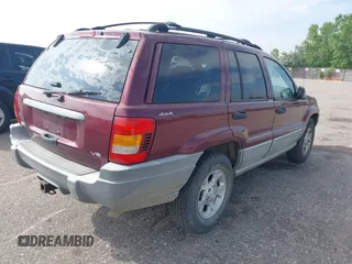1999 Jeep Grand Cherokee Laredo с VIN 1J4GW58N3XC623612, выставлен на аукционе IAAI как лот 42564352 с пробегом 156 808 миль миль и . История ставок и продаж доступна на DreamBid. Изображение 4.