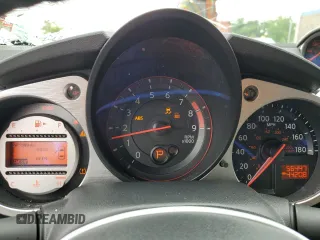 2009 Nissan 370Z Touring with VIN JN1AZ44E69M404789, listed as a Copart auction lot 62015094 with 56,447 mi miles and Salvage Title. Bid and sale history available at carsss.com. Image 9.