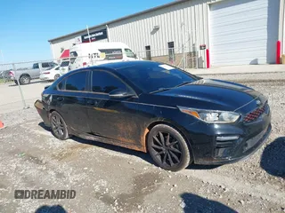 2020 Kia Forte GT-Line z VIN 3KPF34AD3LE250743, wystawiony jako IAAI lot #40988989 z przebiegiem 129 542 mil mil oraz . Historia ofert i sprzedaży dostępna na DreamBid. Obrazek 1.