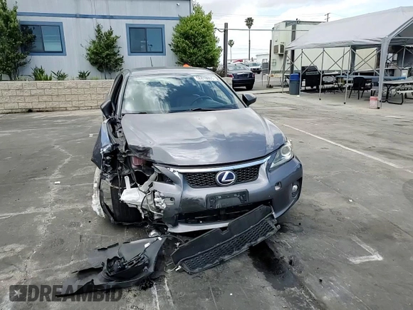 2013 Lexus CT 200h z VIN JTHKD5BH6D2158445, wystawiony jako Copart lot #56818005 z przebiegiem Nie podano mil oraz Szkoda całkowita • Salvage title. Historia ofert i sprzedaży dostępna na DreamBid. Obrazek 13.