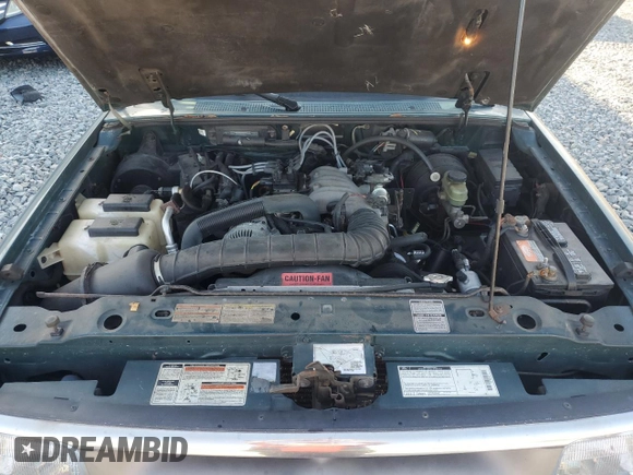 1996 Ford Ranger XL z VIN 1FTCR10U8TUB52746, wystawiony jako Copart lot #52148355 z przebiegiem 139 890 mil mil oraz Szkoda całkowita • Salvage title. Historia ofert i sprzedaży dostępna na DreamBid. Obrazek 11.