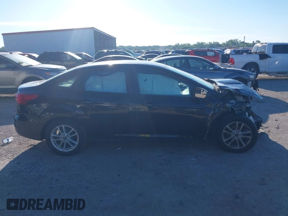 2018 Ford Focus SE with VIN 1FADP3F25JL222689, listed as a IAAI auction lot 42208219 with 127,875 mi miles and . Bid and sale history available at DreamBid. Image 14.