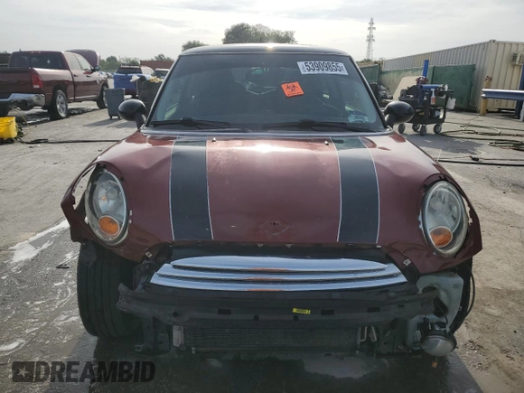 2007 MINI Hardtop with VIN WMWMF33577TT52975, listed as a Copart auction lot 53909855 with 127,325 mi miles and Salvage title. Bid and sale history available at DreamBid. Image 5.