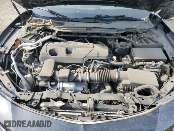 2021 Acura TLX z VIN 19UUB5F38MA004163, wystawiony jako Copart lot #54009015 z przebiegiem Nie podano mil oraz Szkoda całkowita • Salvage title. Historia ofert i sprzedaży dostępna na DreamBid. Obrazek 11.