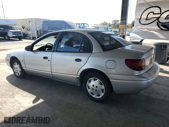2002 Saturn SL with VIN 1G8ZH52882Z177307, listed as a Copart auction lot 59407345 with 63,864 mi miles and Clean title. Bid and sale history available at DreamBid. Image 2.