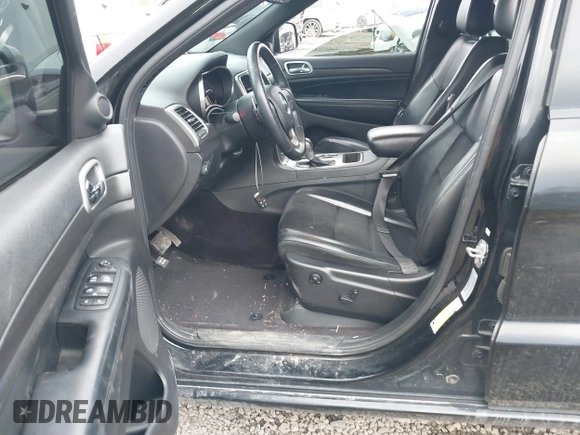 2017 Jeep Grand Cherokee Laredo with VIN 1C4RJFAG9HC882251, listed as a IAAI auction lot 41696710 with 129,627 mi miles and . Bid and sale history available at DreamBid. Image 5.