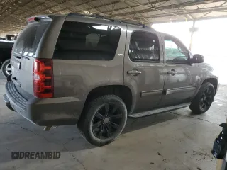2014 Chevrolet Tahoe LT with VIN 1GNSCBE06ER245772, listed as a Copart auction lot 53747375 with 221,139 mi miles and Salvage title. Bid and sale history available at DreamBid. Image 3.