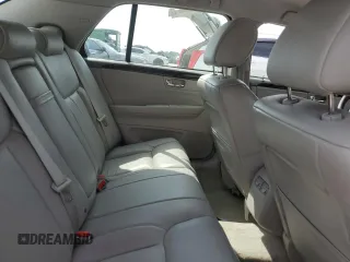 2010 Cadillac DTS 1SA z VIN 1G6KA5EY5AU111898, wystawiony jako Copart lot #54946955 z przebiegiem 44 259 mil mil oraz Szkoda całkowita • Salvage title. Historia ofert i sprzedaży dostępna na DreamBid. Obrazek 10.