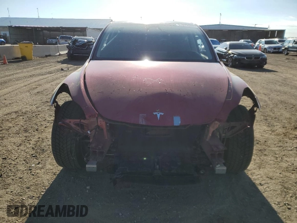 2024 Tesla Model Y Long Range with VIN 7SAYGDEE4RA257722, listed as a Copart auction lot 54577865 with 10,713 mi miles and Salvage Title. Bid and sale history available at DreamBid. Image 5.