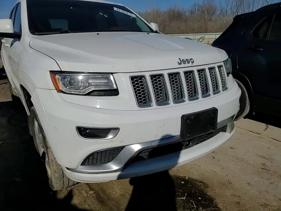 2015 Jeep Grand Cherokee Summit with VIN 1C4RJFJG9FC230372, listed as a Copart auction lot 46185415 with 144,242 mi miles and Salvage Title. Bid and sale history available at carsss.com. Image 10.