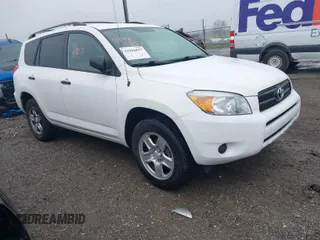2006 Toyota RAV4 with VIN JTMBD33VX65015543, listed as a IAAI auction lot 41986857 with 124,709 mi miles. Bid and sale history available at carsss.com. Image 1.