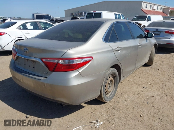 2016 Toyota Camry XLE with VIN 4T4BF1FKXGR519647, listed as a IAAI auction lot 42010266 with 123,595 mi miles and . Bid and sale history available at DreamBid. Image 4.