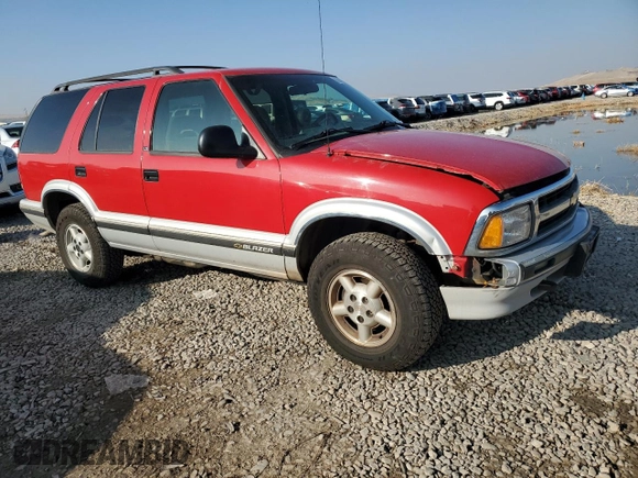 1995 Chevrolet Blazer z VIN 1GNDT13W4S2243226, wystawiony jako Copart lot #81429904 z przebiegiem 1 757 497 mil mil oraz Szkoda całkowita • Salvage title. Historia ofert i sprzedaży dostępna na DreamBid. Obrazek 4.