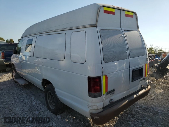 2013 Ford Econoline Cargo Commercial with VIN 1FTNS2EW0DDA92203, listed as a Copart auction lot 73372794 with 330,964 mi miles and Salvage Title. Bid and sale history available at carsss.com. Image 2.