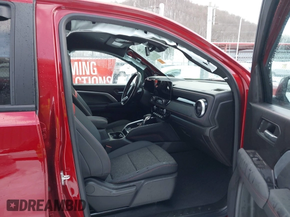 2024 Chevrolet Colorado 4WD Z71 with VIN 1GCPTDEK4R1127526, listed as a IAAI auction lot 41354627 with 8,127 mi miles. Bid and sale history available at carsss.com. Image 5.
