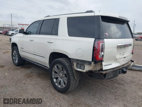 2015 GMC Yukon Denali z VIN 1GKS1CKJ3FR713531, wystawiony jako IAAI lot #41866691 z przebiegiem 157 666 mil mil oraz . Historia ofert i sprzedaży dostępna na DreamBid. Obrazek 3.