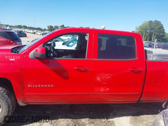 2018 Chevrolet Silverado 1500 LT with VIN 1GCUKREC0JF222376, listed as a IAAI auction lot 42121748 with 143,472 mi miles and . Bid and sale history available at DreamBid. Image 14.