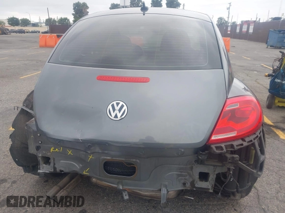 2013 Volkswagen Beetle 2.5L with VIN 3VWJP7AT6DM667477, listed as a IAAI auction lot 42215545 with 87,392 mi miles and . Bid and sale history available at DreamBid. Image 16.