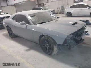 2021 Dodge Challenger GT with VIN 2C3CDZKG6MH642079, listed as a IAAI auction lot 41612713 with 76,863 mi miles. Bid and sale history available at carsss.com. Image 1.
