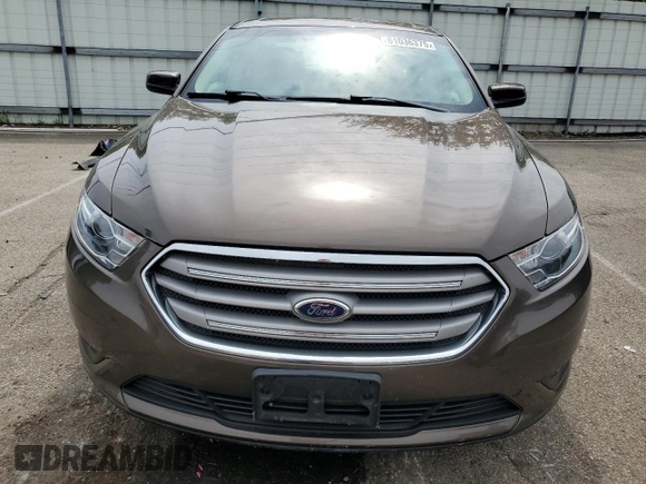 2015 Ford Taurus SEL with VIN 1FAHP2E89FG193926, listed as a Copart auction lot 61036375 with 23,963 mi miles and Salvage title. Bid and sale history available at DreamBid. Image 5.