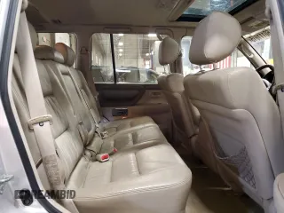 2002 Toyota Land Cruiser z VIN JTEHT05J922018964, wystawiony jako Copart lot #60111015 z przebiegiem 245 890 mil mil oraz Czysty tytuł • Clean title. Historia ofert i sprzedaży dostępna na DreamBid. Obrazek 11.