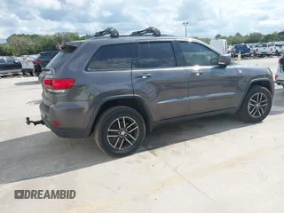 2018 Jeep Grand Cherokee Trailhawk with VIN 1C4RJFLG8JC427345, listed as a IAAI auction lot 41557222 with 49,469 mi miles and . Bid and sale history available at DreamBid. Image 4.