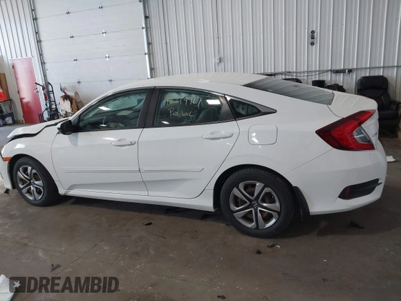 2017 Honda Civic LX with VIN 19XFC2F5XHE007668, listed as a IAAI auction lot 42219927 with 132,444 mi miles and . Bid and sale history available at DreamBid. Image 14.