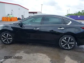 2018 Nissan Altima SR with VIN 1N4AL3AP5JC135313, listed as a IAAI auction lot 41964455 with 86,042 mi miles and . Bid and sale history available at carsss.com. Image 14.