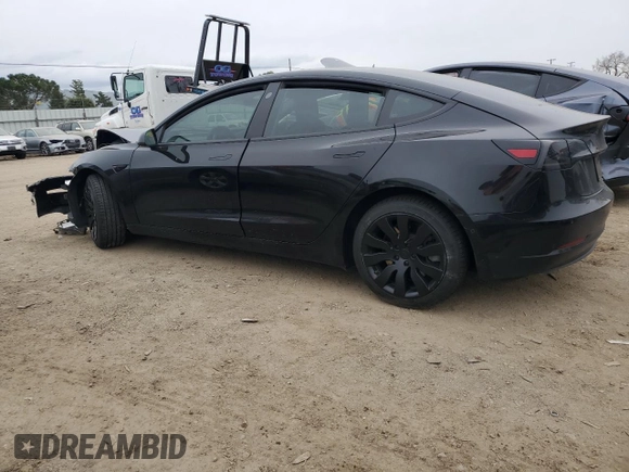 2021 Tesla Model 3 Standard Range Plus with VIN 5YJ3E1EA6MF877752, listed as a Copart auction lot 44776425 with Not Provided miles and Salvage Title. Bid and sale history available at DreamBid. Image 2.