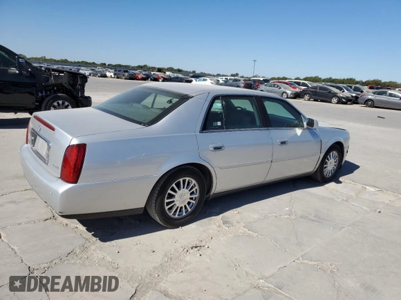 2003 Cadillac DeVille DHS z VIN 1G6KE54Y13U124690, wystawiony jako Copart lot #73757984 z przebiegiem 101 286 mil mil oraz Szkoda całkowita • Salvage title. Historia ofert i sprzedaży dostępna na DreamBid. Obrazek 3.