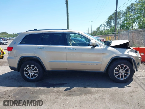 2014 Jeep Grand Cherokee Limited with VIN 1C4RJEBG4EC528934, listed as a IAAI auction lot 42033511 with 63,601 mi miles and . Bid and sale history available at DreamBid. Image 13.