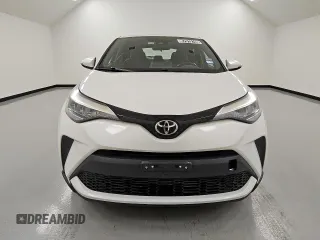 2021 Toyota C-HR LE z VIN NMTKHMBX0MR120577, wystawiony jako Copart lot #57019105 z przebiegiem 152 488 mil mil oraz Czysty tytuł • Clean title. Historia ofert i sprzedaży dostępna na DreamBid. Obrazek 5.