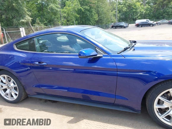 2015 Ford Mustang EcoBoost z VIN 1FA6P8TH9F5361668, wystawiony jako IAAI lot #42616707 z przebiegiem 73 798 mil mil oraz . Historia ofert i sprzedaży dostępna na DreamBid. Obrazek 13.