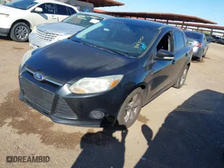 2013 Ford Focus SE with VIN 1FADP3F2XDL337583, listed as a IAAI auction lot 41842030 with 163,947 mi miles. Bid and sale history available at carsss.com. Image 2.