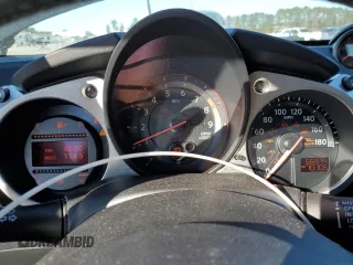 2014 Nissan 370Z Touring with VIN JN1AZ4FH3EM620195, listed as a Copart auction lot 83207104 with 66,974 mi miles and Salvage Title. Bid and sale history available at DreamBid. Image 9.