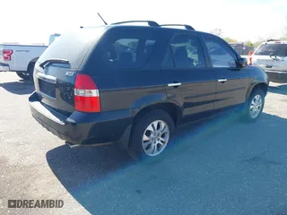 2003 Acura MDX Touring Pkg RES w/Navigation System with VIN 2HNYD18913H514157, listed as a IAAI auction lot 42034863 with 235,941 mi miles. Bid and sale history available at carsss.com. Image 4.