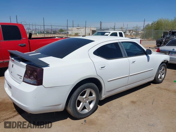2010 Dodge Charger SXT with VIN 2B3CA3CV5AH297994, listed as a IAAI auction lot 42153457 with 157,017 mi miles. Bid and sale history available at carsss.com. Image 4.
