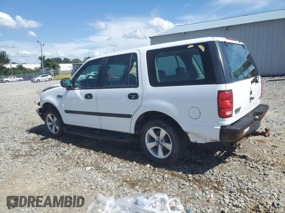 1997 Ford Expedition XLT with VIN 1FMEU17L2VLB74797, listed as a Copart auction lot 61377745 with 236,140 mi miles and Salvage title. Bid and sale history available at DreamBid. Image 2.