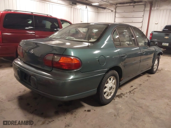 1998 Chevrolet Malibu LS with VIN 1G1NE52M6W6104642, listed as a IAAI auction lot 41636923 with 116,944 mi miles. Bid and sale history available at carsss.com. Image 4.