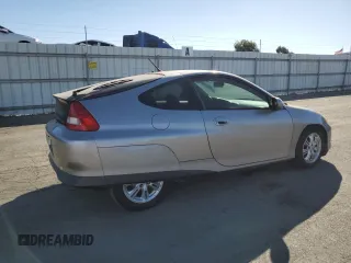 2004 Honda Insight z VIN JHMZE14794T000085, wystawiony jako Copart lot #74238984 z przebiegiem 165 012 mil mil oraz Szkoda całkowita • Salvage title. Historia ofert i sprzedaży dostępna na DreamBid. Obrazek 3.
