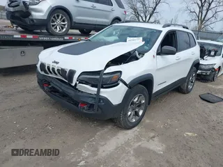 2019 Jeep Cherokee Trailhawk Elite with VIN 1C4PJMBX4KD351261, listed as a IAAI auction lot 41944727 with 97,849 mi miles. Bid and sale history available at carsss.com. Image 2.
