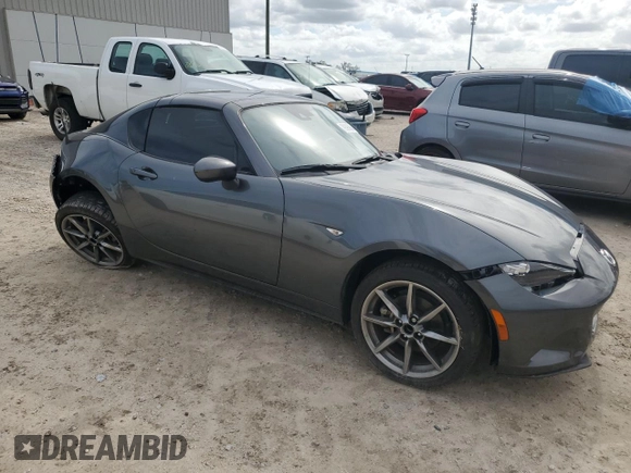 2023 Mazda MX-5 Miata Grand Touring with VIN JM1NDAM7XP0558827, listed as a Copart auction lot 79390864 with 14,901 mi miles and Salvage title. Bid and sale history available at DreamBid. Image 4.