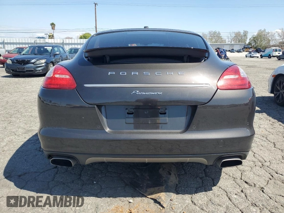 2013 Porsche Panamera с VIN WP0AA2A72DL014902, выставлен на аукционе Copart как лот 49202365 с пробегом 78 758 миль миль и Списание • Salvage title. История ставок и продаж доступна на DreamBid. Изображение 6.