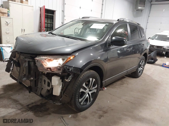 2018 Toyota RAV4 LE with VIN JTMBFREV8JJ243177, listed as a IAAI auction lot 41830598 with 64,231 mi miles. Bid and sale history available at carsss.com. Image 17.