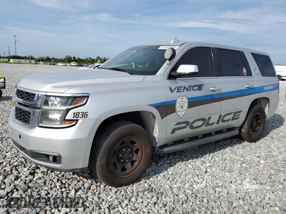 2018 Chevrolet Tahoe Commercial with VIN 1GNLCDEC2JR275159, listed as a Copart auction lot 61337355 with 84,712 mi miles and Salvage title. Bid and sale history available at DreamBid. Image 1.