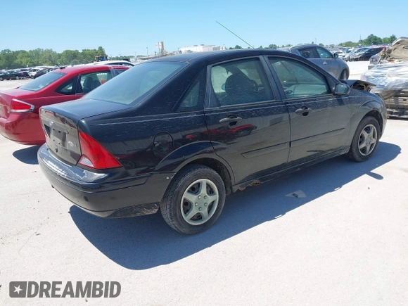 2003 Ford Focus SE with VIN 1FAFP34P83W150783, listed as a IAAI auction lot 42319653 with Not provided miles and . Bid and sale history available at DreamBid. Image 4.