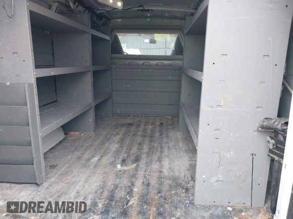 2021 Chevrolet Express Cargo with VIN 1GCWGAFP6M1200316, listed as a IAAI auction lot 41943291 with 87,299 mi miles and . Bid and sale history available at DreamBid. Image 8.