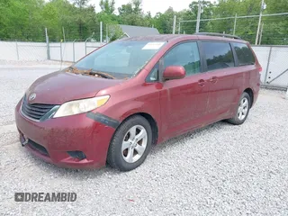 2011 Toyota Sienna LE AAS with VIN 5TDKK3DC2BS003748, listed as a IAAI auction lot 42142090 with 246,737 mi miles. Bid and sale history available at carsss.com. Image 2.
