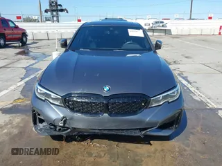 2020 BMW 3 Series M340i z VIN WBA5U7C04LFH22006, wystawiony jako IAAI lot #41959937 z przebiegiem 32 113 mil mil oraz . Historia ofert i sprzedaży dostępna na DreamBid. Obrazek 6.