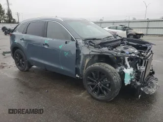 2022 Mazda CX-9 Grand Touring with VIN JM3TCBDY6N0613660, listed as a Copart auction lot 45168735 with 27,997 mi miles and Salvage Title. Bid and sale history available at carsss.com. Image 4.